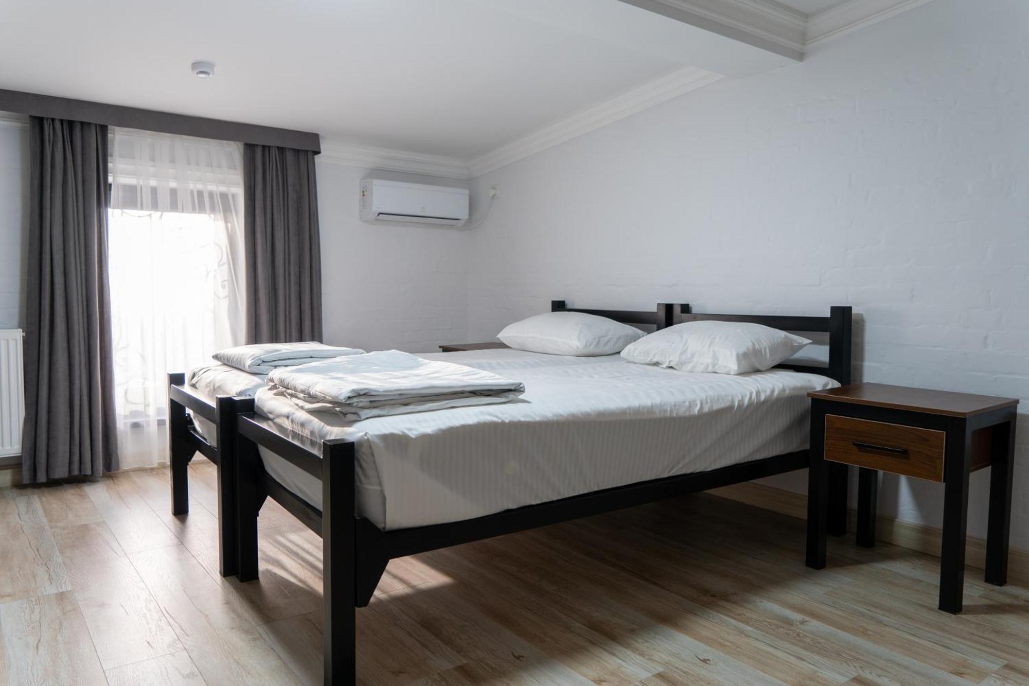 Nest Inn Ташкент Стая снимка